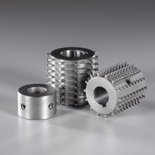 Three sprockets on a table.