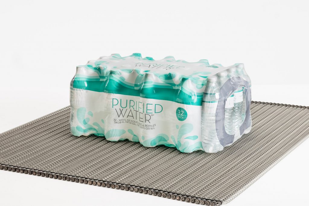 WIR_1811_BELT_007 A chain driven conveyor belt transporting a case of spring water.